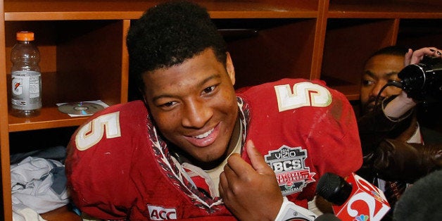 PASADENA, CA - JANUARY 06: Quarterback Jameis Winston #5 of the Florida State Seminoles celebrates in the locker room after defeating the Auburn Tigers 34-31 in the 2014 Vizio BCS National Championship Game at the Rose Bowl on January 6, 2014 in Pasadena, California. (Photo by Kevin C. Cox/Getty Images)