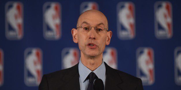 NBA Commissioner Adam Silver holds a press conference to discuss Los Angeles Clippers owner Donald Sterling's racist comments, at the Hilton Hotel in New York, April 29, 2014. Silver announced that Sterling will be banned from the NBA for life and will be fined 2.5 million USD for racist comments released in audio recordings. AFP PHOTO/Emmanuel Dunand (Photo credit should read EMMANUEL DUNAND/AFP/Getty Images)