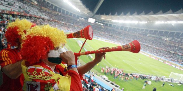 Supporters of Spain play the vuvuzela at the end of the 2010 World Cup semi-final football match Germany vs. Spain on July 7, 2010 at Moses Mabhida stadium in Durban. Spain defeated Germany 1-0. AFP PHOTO / RAJESH JANTILAL - NO PUSH TO MOBILE / MOBILE USE SOLELY WITHIN EDITORIAL ARTICLE - (Photo credit should read RAJESH JANTILAL/AFP/Getty Images)
