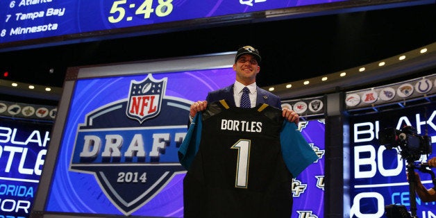 NEW YORK, NY - MAY 08: Blake Bortles of the UCF Knights poses with a jersey after he was picked #3 overall by the Jacksonville Jaguars during the first round of the 2014 NFL Draft at Radio City Music Hall on May 8, 2014 in New York City. (Photo by Elsa/Getty Images)