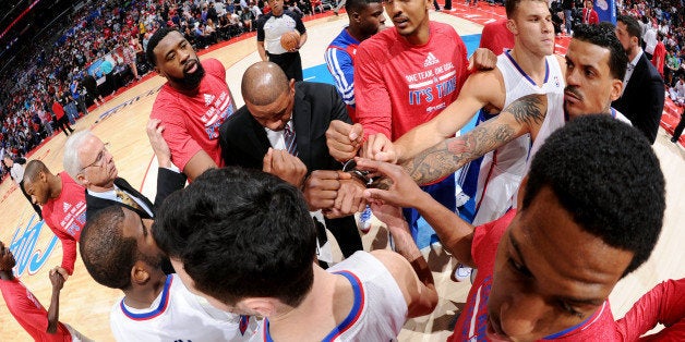 LOS ANGELES, CA - MAY 11: The Los Angeles Clippers huddle up before a game against the Oklahoma City Thunder in Game Four of the Western Conference Semifinals during the 2014 NBA Playoffs at Staples Center on May 11, 2014 in Los Angeles, California. NOTE TO USER: User expressly acknowledges and agrees that, by downloading and/or using this Photograph, user is consenting to the terms and conditions of the Getty Images License Agreement. Mandatory Copyright Notice: Copyright 2014 NBAE (Photo by Andrew D. Bernstein/NBAE via Getty Images)