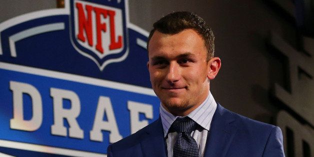 NEW YORK, NY - MAY 08: Johnny Manziel of the Texas A&M Aggiesis introduced during the first round of the 2014 NFL Draft at Radio City Music Hall on May 8, 2014 in New York City. (Photo by Elsa/Getty Images)