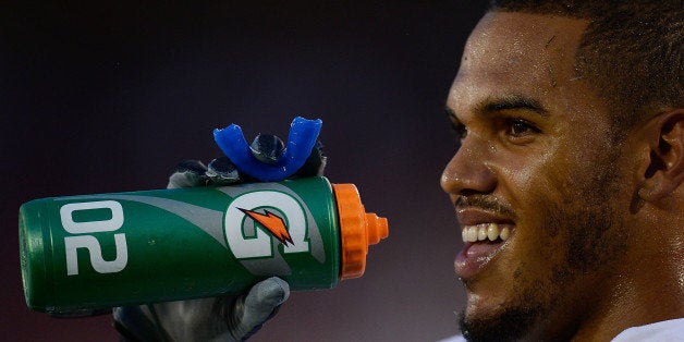 STANFORD, CA - NOVEMBER 30: Anthony Barr #11 of the UCLA Bruins takes a drink of water from a Gatorade bottle during pre-gam