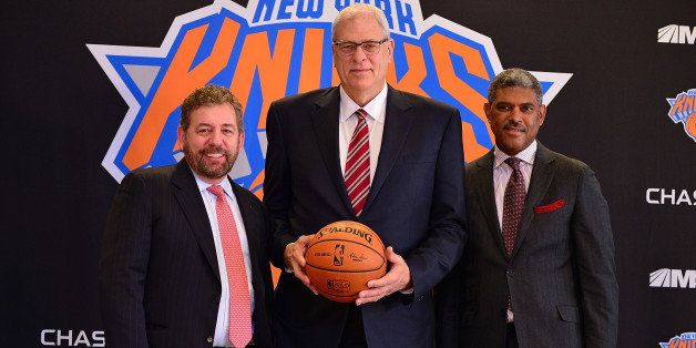 NEW YORK, NY - MARCH 18: James Dolan, Phil Jackson and Steve Mills attend New York Knicks press conference announcing Phil Jackson as team President at Madison Square Garden on March 18, 2014 in New York City. (Photo by James Devaney/WireImage)