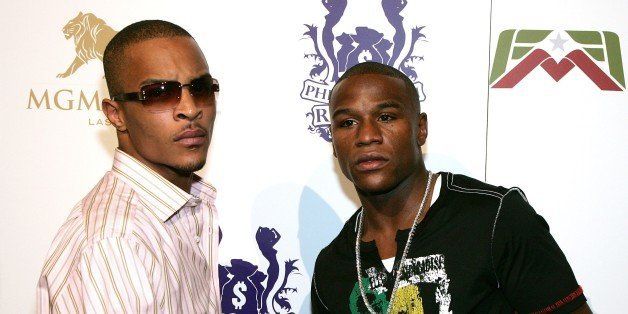LAS VEGAS - JULY 29: Rapper T.I. (L) and boxer Floyd Mayweather Jr. arrive at a party at Studio 54 inside the MGM Grand Hotel/Casino July 29, 2007 in Las Vegas, Nevada. (Photo by Ethan Miller/Getty Images for MGM)