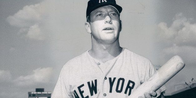 UNSPECIFIED - UNDATED: Mickey Mantle poses for the camera with bat in hand in this undated photo. (Photo by Sports Studio Photos/Getty Images)