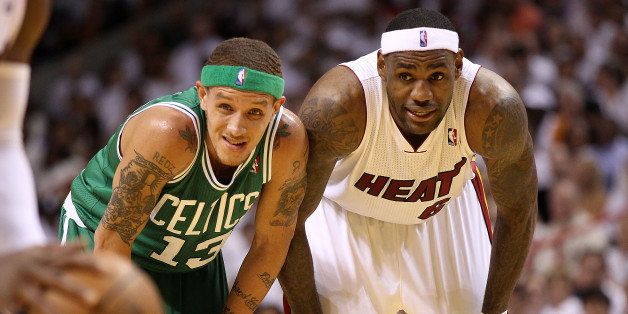 MIAMI, FL - MAY 03: LeBron James #6 of the Miami Heat talks with Delonte West #13 of the Boston Celtics during Game Two of the Eastern Conference Semifinals of the 2011 NBA Playoffs at American Airlines Arena on May 3, 2011 in Miami, Florida. NOTE TO USER: User expressly acknowledges and agrees that, by downloading and/or using this Photograph, User is consenting to the terms and conditions of the Getty Images License Agreement. (Photo by Mike Ehrmann/Getty Images)