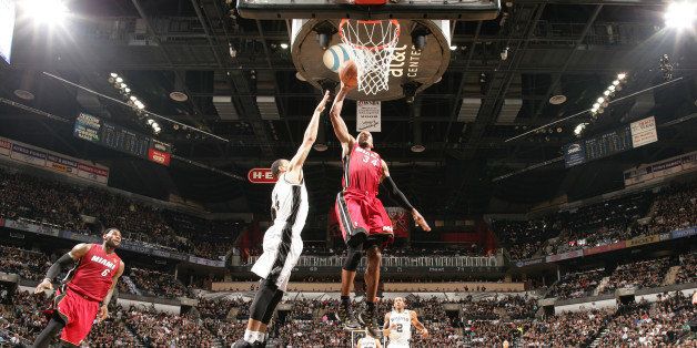 SAN ANTONIO, TX - JUNE 5: Ray Allen #34 of the Miami Heat dunks against Danny Green #4 of the San Antonio Spurs in Game One of the 2014 NBA Finals at AT&T Center on June 5, 2014 in San Antonio, Texas. NOTE TO USER: User expressly acknowledges and agrees that, by downloading and/or using this photograph, user is consenting to the terms and conditions of the Getty Images License Agreement. Mandatory Copyright Notice: Copyright 2014 NBAE (Photo by Nathaniel S. Butler/NBAE via Getty Images)