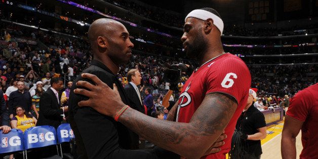 LOS ANGELES, CA - DECEMBER 25: Kobe Bryant #24 of the Los Angeles Lakers and LeBron James #6 of the Miami Heat converse after a game at STAPLES Center on December 25, 2013 in Los Angeles, California. NOTE TO USER: User expressly acknowledges and agrees that, by downloading and/or using this Photograph, user is consenting to the terms and conditions of the Getty Images License Agreement. Mandatory Copyright Notice: Copyright 2013 NBAE (Photo by Andrew D. Bernstein/NBAE via Getty Images)