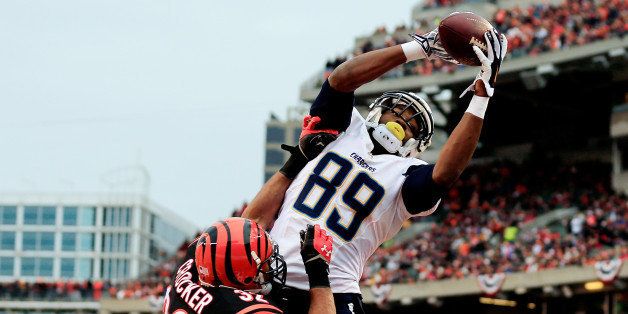 CINCINNATI, OH - JANUARY 05: Tight end Ladarius Green #89 of the San Diego Chargers catches a touchdown in the third quarter as defensive back Chris Crocker #32 of the Cincinnati Bengals defends during a Wild Card Playoff game at Paul Brown Stadium on January 5, 2014 in Cincinnati, Ohio. (Photo by Rob Carr/Getty Images)