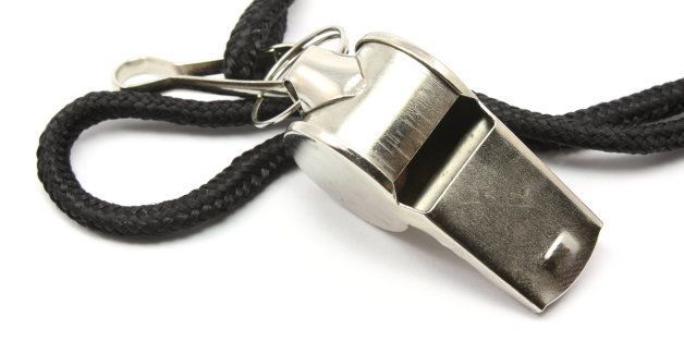 a close up of a silver whistle...