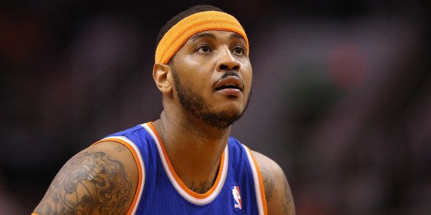 PHOENIX, AZ - MARCH 28: Carmelo Anthony #7 of the New York Knicks during the NBA game against the Phoenix Suns at US Airways Center on March 28, 2014 in Phoenix, Arizona. The Suns defeated the Knicks 112-88. NOTE TO USER: User expressly acknowledges and agrees that, by downloading and or using this photograph, User is consenting to the terms and conditions of the Getty Images License Agreement. (Photo by Christian Petersen/Getty Images) 