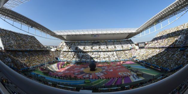Participants take part in the opening ceremony of the 2014 FIFA World Cup at the Corinthians Arena in Sao Paulo on June 12, 2014, prior to the opening Group A football match between Brazil and Croatia. AFP PHOTO / FRANCOIS-XAVIER MARIT (Photo credit should read FRANCOIS-XAVIER MARIT/AFP/Getty Images)