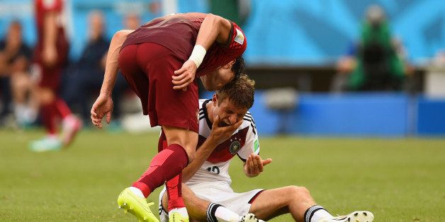 SALVADOR, BRAZIL - JUNE 16: Pepe of Portugal headbutts Thomas Mueller of Germany resulting in a red card during the 2014 FIFA World Cup Brazil Group G match between Germany and Portugal at Arena Fonte Nova on June 16, 2014 in Salvador, Brazil. (Photo by Stu Forster/Getty Images)