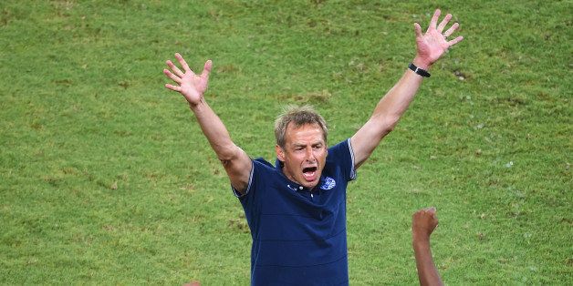 NATAL, BRAZIL - JUNE 16: Head coach Jurgen Klinsmann of the United States reacts after defeating Ghana 2-1 during the 2014 FIFA World Cup Brazil Group G match between Ghana and the United States at Estadio das Dunas on June 16, 2014 in Natal, Brazil. (Photo by Laurence Griffiths/Getty Images)