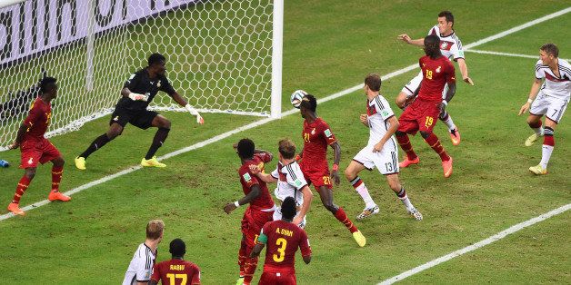 FORTALEZA, BRAZIL - JUNE 21: Miroslav Klose of Germany scores his team's second goal past Fatawu Dauda of Ghana during the 2014 FIFA World Cup Brazil Group G match between Germany and Ghana at Castelao on June 21, 2014 in Fortaleza, Brazil. (Photo by Jamie McDonald/Getty Images)