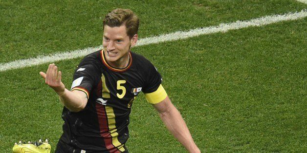 Belgium's defender and captain Jan Vertonghen celebrates after scoring during a Group H football match between South Korea and Belgium at the Corinthians Arena in Sao Paulo during the 2014 FIFA World Cup on June 26, 2014. AFP PHOTO/ FABRICE COFFRINI (Photo credit should read FABRICE COFFRINI/AFP/Getty Images)