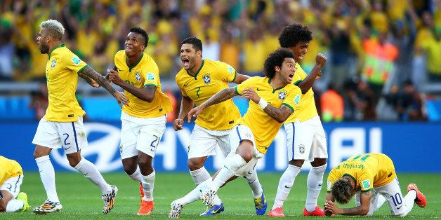 BELO HORIZONTE, BRAZIL - JUNE 28: Brazil celebrates after defeating Chile in a penalty shootout during the 2014 FIFA World Cup Brazil round of 16 match between Brazil and Chile at Estadio Mineirao on June 28, 2014 in Belo Horizonte, Brazil. (Photo by Paul Gilham/Getty Images)