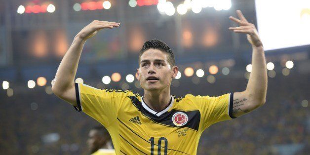 Colombia's midfielder James Rodriguez celebrates after scoring during the Round of 16 football match between Colombia and Uruguay at the Maracana Stadium in Rio de Janeiro during the 2014 FIFA World Cup on June 28, 2014. AFP PHOTO / DANIEL GARCIA (Photo credit should read DANIEL GARCIA/AFP/Getty Images)