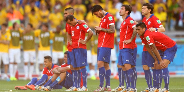 BELO HORIZONTE, BRAZIL - JUNE 28: Chile players look on preparing for penalty kicks during the 2014 FIFA World Cup Brazil round of 16 match between Brazil and Chile at Estadio Mineirao on June 28, 2014 in Belo Horizonte, Brazil. (Photo by Ronald Martinez/Getty Images)