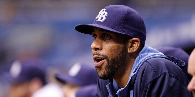 ST. PETERSBURG, FL - JUNE 23: Pitcher David Price #14 of the Tampa Bay Rays looks on from the dugout during the eighth inning of a game against the Pittsburgh Pirates on June 23, 2014 at Tropicana Field in St. Petersburg, Florida. (Photo by Brian Blanco/Getty Images)