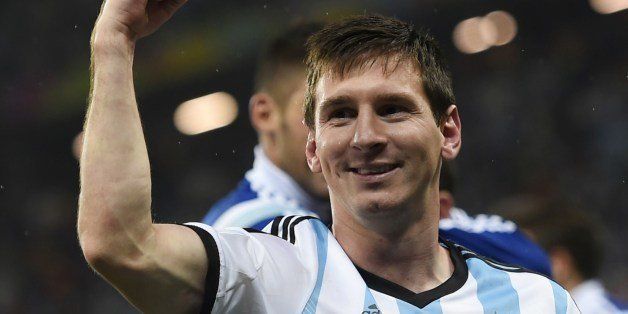 Argentina's forward and captain Lionel Messi celebrates after winning their FIFA World Cup semi-final match against the Netherlands in a penalty shoot-out following extra time at The Corinthians Arena in Sao Paulo on July 9, 2014. AFP PHOTO / FABRICE COFFRINI (Photo credit should read FABRICE COFFRINI/AFP/Getty Images)