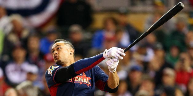 MINNEAPOLIS, MN - JULY 14: National League All-Star Giancarlo Stanton #27 of the Miami Marlins bats during the Gillette Home Run Derby at Target Field on July 14, 2014 in Minneapolis, Minnesota. (Photo by Elsa/Getty Images)