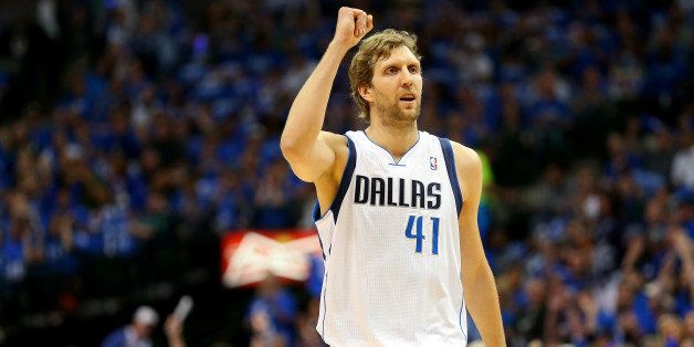 DALLAS, TX - MAY 02: Dirk Nowitzki #41 of the Dallas Mavericks reacts against the San Antonio Spurs in Game Six of the Western Conference Quarterfinals during the 2014 NBA Playoffs at American Airlines Center on May 2, 2014 in Dallas, Texas. NOTE TO USER: User expressly acknowledges and agrees that, by downloading and or using this photograph, User is consenting to the terms and conditions of the Getty Images License Agreement. (Photo by Ronald Martinez/Getty Images)