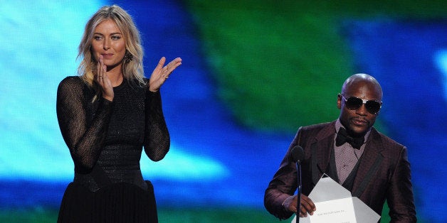 LOS ANGELES, CA - JULY 16: Tennis player Maria Sharapova and boxer Floyd Mayweather Jr. speak onstage during the 2014 ESPYS at Nokia Theatre L.A. Live on July 16, 2014 in Los Angeles, California. (Photo by Kevin Winter/Getty Images)