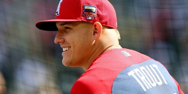 MINNEAPOLIS, MN - JULY 15: American League All-Star Mike Trout #27 of the Los Angeles Angels looks on during batting practice before the 85th MLB All-Star Game at Target Field on July 15, 2014 in Minneapolis, Minnesota. (Photo by Elsa/Getty Images)