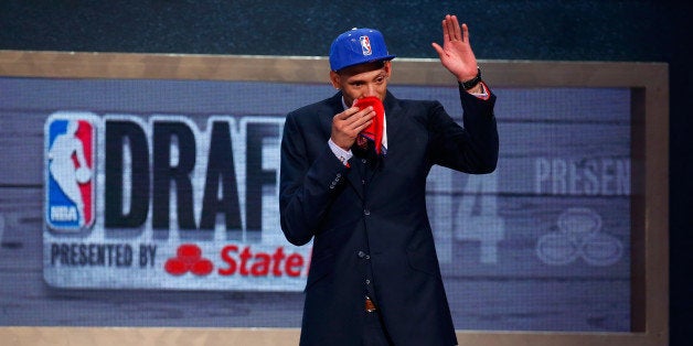 NEW YORK, NY - JUNE 26: Isaiah Austin of Baylor is honored on stage during the 2014 NBA Draft at Barclays Center on June 26, 2014 in the Brooklyn borough of New York City. NOTE TO USER: User expressly acknowledges and agrees that, by downloading and/or using this Photograph, user is consenting to the terms and conditions of the Getty Images License Agreement. (Photo by Mike Stobe/Getty Images)