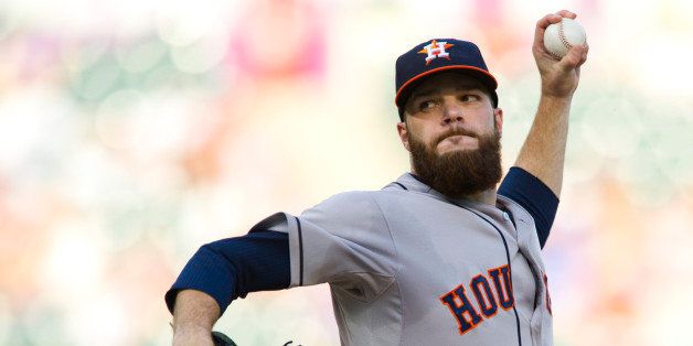 ARLINGTON, TX - JULY 09: Dallas Keuchel #60 of the Houston Astros pitches during the first inning against the Texas Rangers on June 5, 2014 at Globe Life Park in Arlington in Arlington, Texas. (Photo by Cooper Neill/Getty Images)
