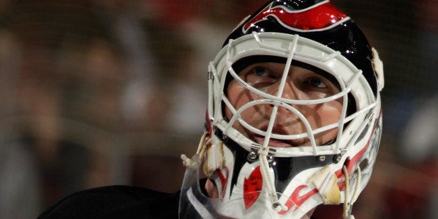 NEWARK, NJ - APRIL 11: Martin Brodeur #30 of the New Jersey Devils takes a break during the third period against the New York Islanders at the Prudential Center on April 11, 2014 in Newark, New Jersey. The Islanders defeated the Devils 3-2 in the shootout. (Photo by Bruce Bennett/Getty Images) 