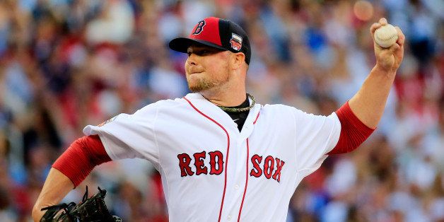 MINNEAPOLIS, MN - JULY 15: American League All-Star Jon Lester #31 of the Boston Red Sox during the 85th MLB All-Star Game at Target Field on July 15, 2014 in Minneapolis, Minnesota. (Photo by Rob Carr/Getty Images) 