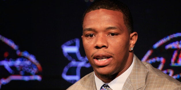 OWINGS MILLS, MD - MAY 23: Running back Ray Rice of the Baltimore Ravens addresses a news conference with his wife Janay (no