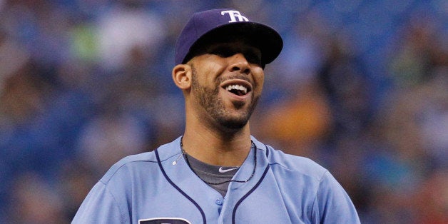 ST. PETERSBURG, FL - JULY 13: Pitcher David Price #14 of the Tampa Bay Rays smiles on the mound during the eighth inning of