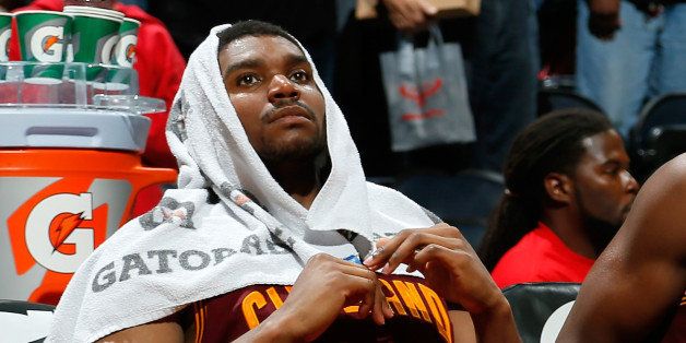 ATLANTA, GA - DECEMBER 06: Andrew Bynum #21 and Tristan Thompson #13 of the Cleveland Cavaliers sit on the bench as time expires in their 108-89 loss to the Atlanta Hawks at Philips Arena on December 6, 2013 in Atlanta, Georgia. NOTE TO USER: User expressly acknowledges and agrees that, by downloading and or using this photograph, User is consenting to the terms and conditions of the Getty Images License Agreement. (Photo by Kevin C. Cox/Getty Images)