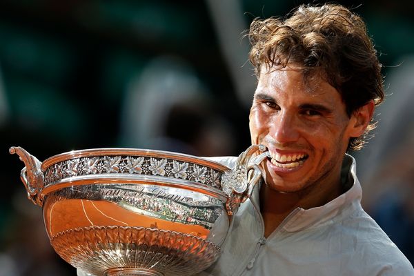 Nadal owns 14 Grand Slam titles, including a record nine French Open championships. By winning the 2014 French Open (pictured