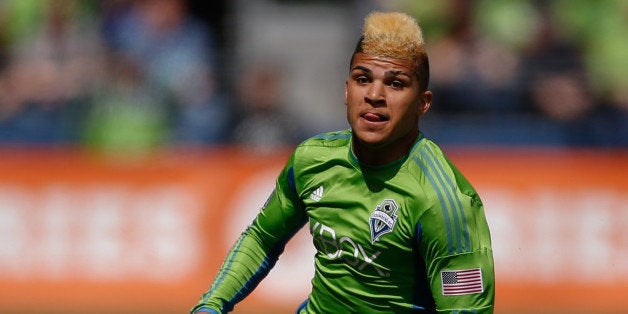 SEATTLE, WA - APRIL 26: DeAndre Yedlin #17 of the Seattle Sounders FC follows the play against the Colorado Rapids at CenturyLink Field on April 26, 2014 in Seattle, Washington. The Sounders defeated the Rapids 4-1. (Photo by Otto Greule Jr/Getty Images)