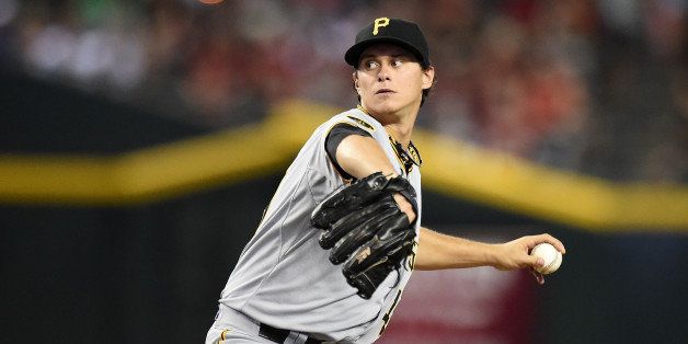 PHOENIX, AZ - JULY 31: Jeff Locke #49 of the Pittsburgh Pirates delivers a pitch against the Arizona Diamondbacks at Chase Field on July 31, 2014 in Phoenix, Arizona. (Photo by Norm Hall/Getty Images)