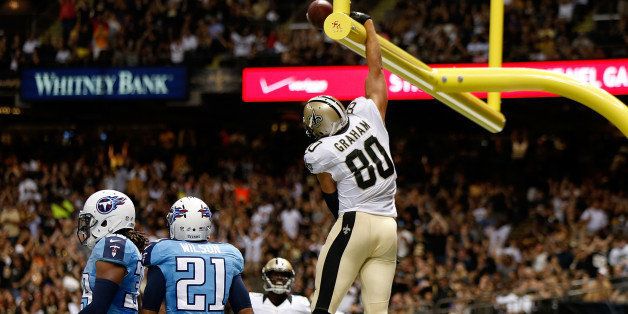 NEW ORLEANS, LA - AUGUST 15: Jimmy Graham #80 of the New Orleans Saints celebrates a touchdown during a preseason game between the New Orleans Saints and the Tennessee Titans at Mercedes-Benz Superdome on August 15, 2014 in New Orleans, Louisiana. (Photo by Sean Gardner/Getty Images)