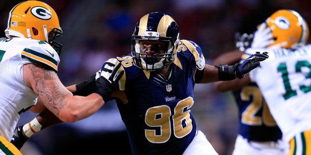 ST LOUIS, MO - AUGUST 16: Defensive end Michael Sam #96 of the St. Louis Rams in action during the preseason game against the Green Bay Packers at Edward Jones Dome on August 16, 2014 in St Louis, Missouri. (Photo by Jamie Squire/Getty Images)