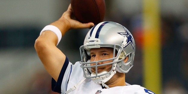 ARLINGTON, TX - AUGUST 28: Tony Romo #9 of the Dallas Cowboys warms up before the start of the game against the Denver Bronc