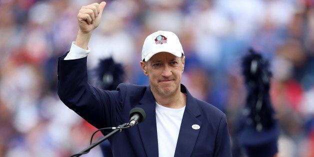 ORCHARD PARK, NY - SEPTEMBER 14: Jim Kelly, former quarterback of the Buffalo Bills is emotional as he speaks to the crowd before the game between the Buffalo Bills and the Miami Dolphins at Ralph Wilson Stadium on September 14, 2014 in Orchard Park, New York. (Photo by Vaughn Ridley/Getty Images)