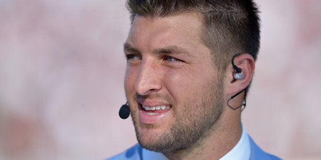 COLUMBIA, SC - AUGUST 28: Tim Tebow of the SEC Newtork on the field before a game between the South Carolina Gamecocks and the Texas A&M Aggies at Williams-Brice Stadium on August 28, 2014 in Columbia, South Carolina. (Photo by Grant Halverson/Getty Images) 