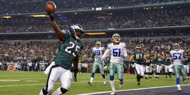 ARLINGTON, TX - DECEMBER 29: LeSean McCoy #25 of the Philadelphia Eagles runs into the end zone for a touchdown against the