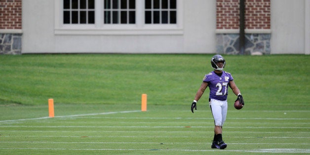 Baltimore Ravens running back Ray Rice walks on the field during NFL football minicamp, Thursday, June 19, 2014, at the team'