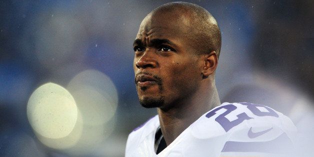 NASHVILLE, TN - AUGUST 28: Running back Adrian Peterson #28 of the Minnesota Vikings looks on during a preseason game against the Tennessee Titans at LP Field on August 28, 2014 in Nashville, Tennessee. (Photo by Ronald C. Modra/Sports Imagery/ Getty Images) 