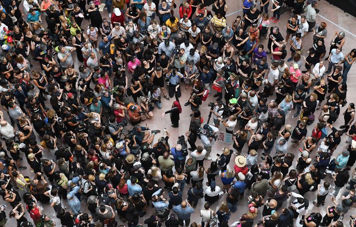 Demonstrators gather Thursday inside the Hart Senate Office Building for a rally against Brett Kavanaugh's Supreme Court nomination. Many of the protesters were detained by police.