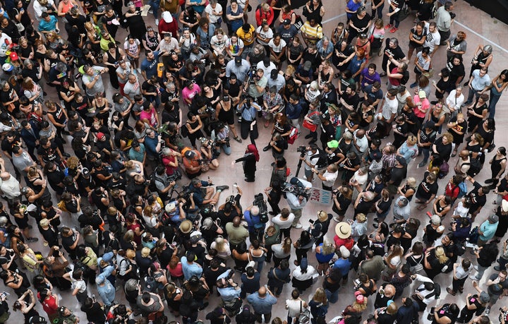 Protesters gather Thursday inside the Hart Senate office building for a rally against Supreme Court President Brett Kavanaugh